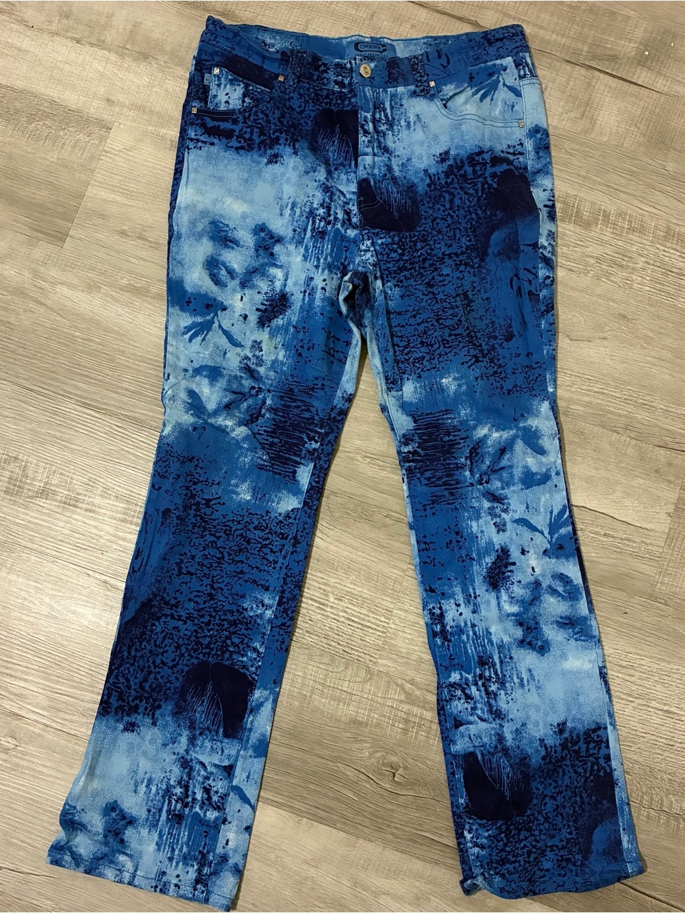 crest printed blue jeans